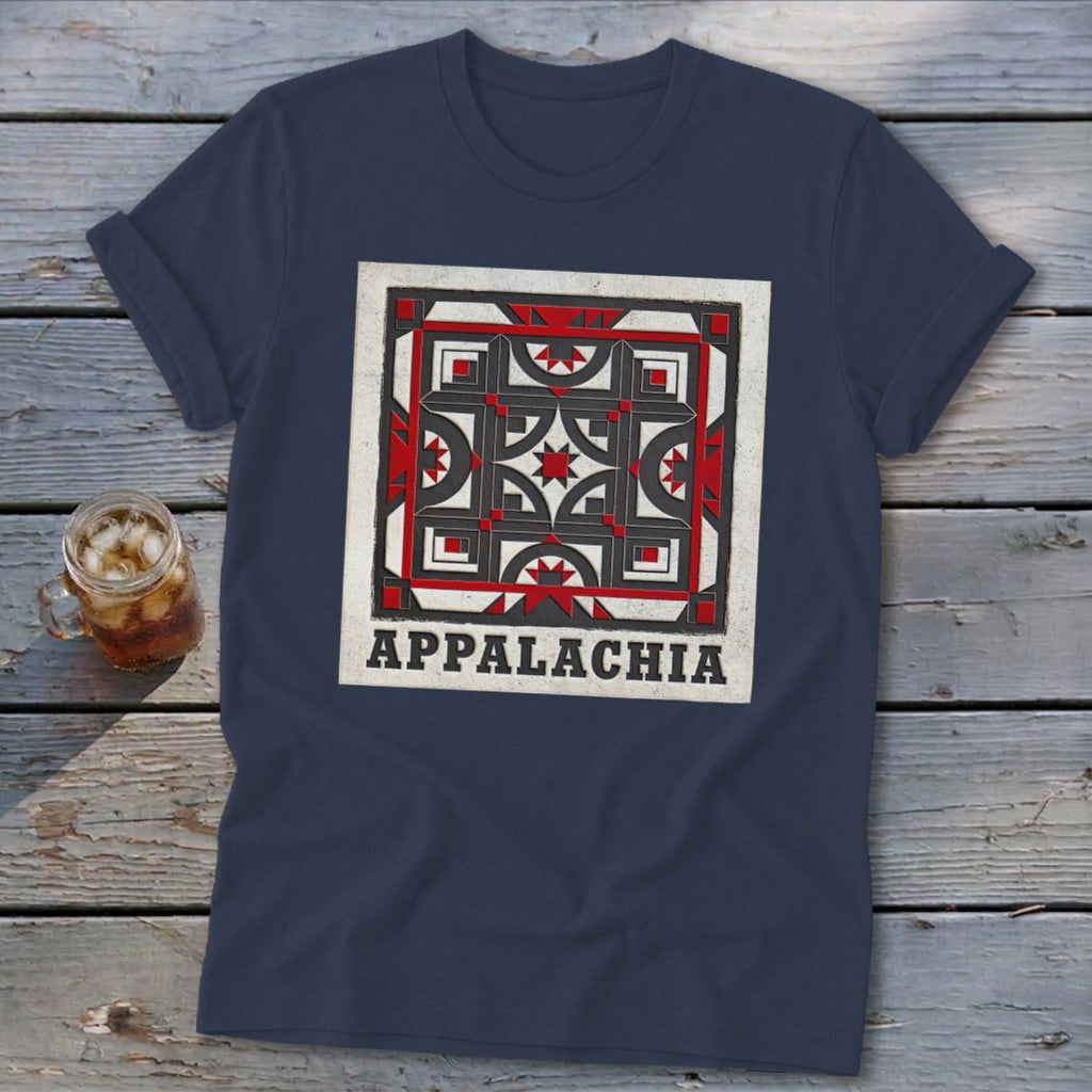 Dark blue t-shirt featuring a square geometric quilt pattern and the text Appalachia laid on wooden planks.