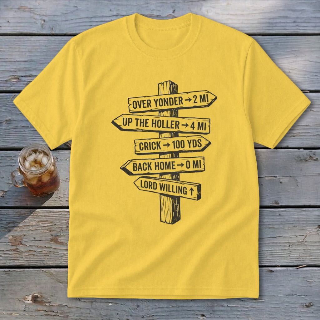 A yellow t-shirt featuring a black graphic of a wooden signpost with directional distance text.