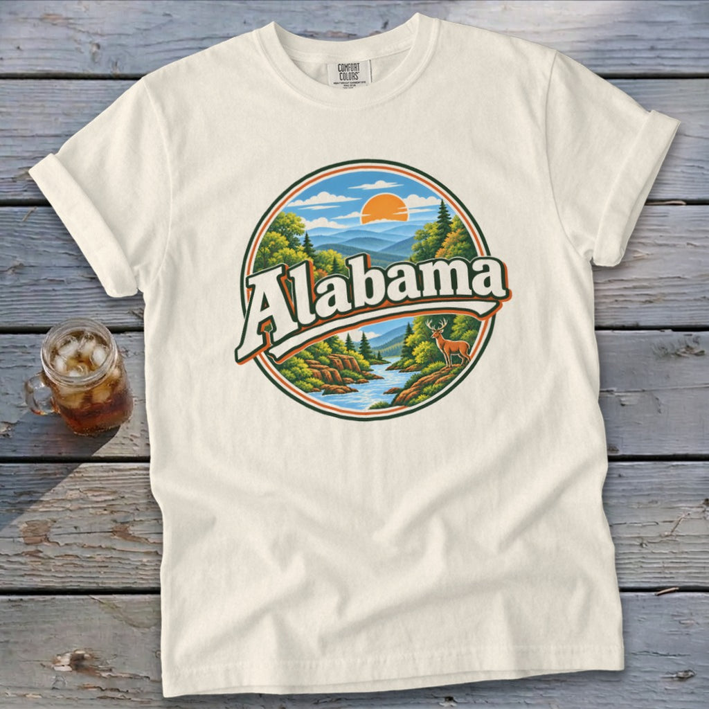 Cream t-shirt with circular graphic featuring "Alabama" and a deer by a river.