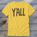 Yellow t-shirt with "Y'ALL" printed in dark brown text.
