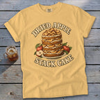 Yellow t-shirt with "Dried Apple Stack Cake" graphic featuring a stacked cake.