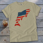 A light olive t-shirt featuring a leaping trout with an American flag graphic.