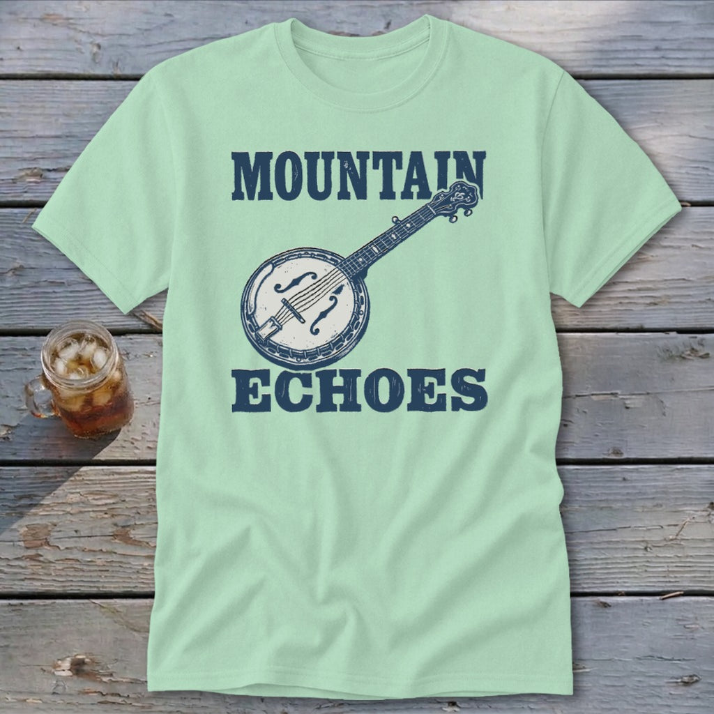 A mint green t-shirt featuring a dark blue banjo graphic with the words MOUNTAIN ECHOES.