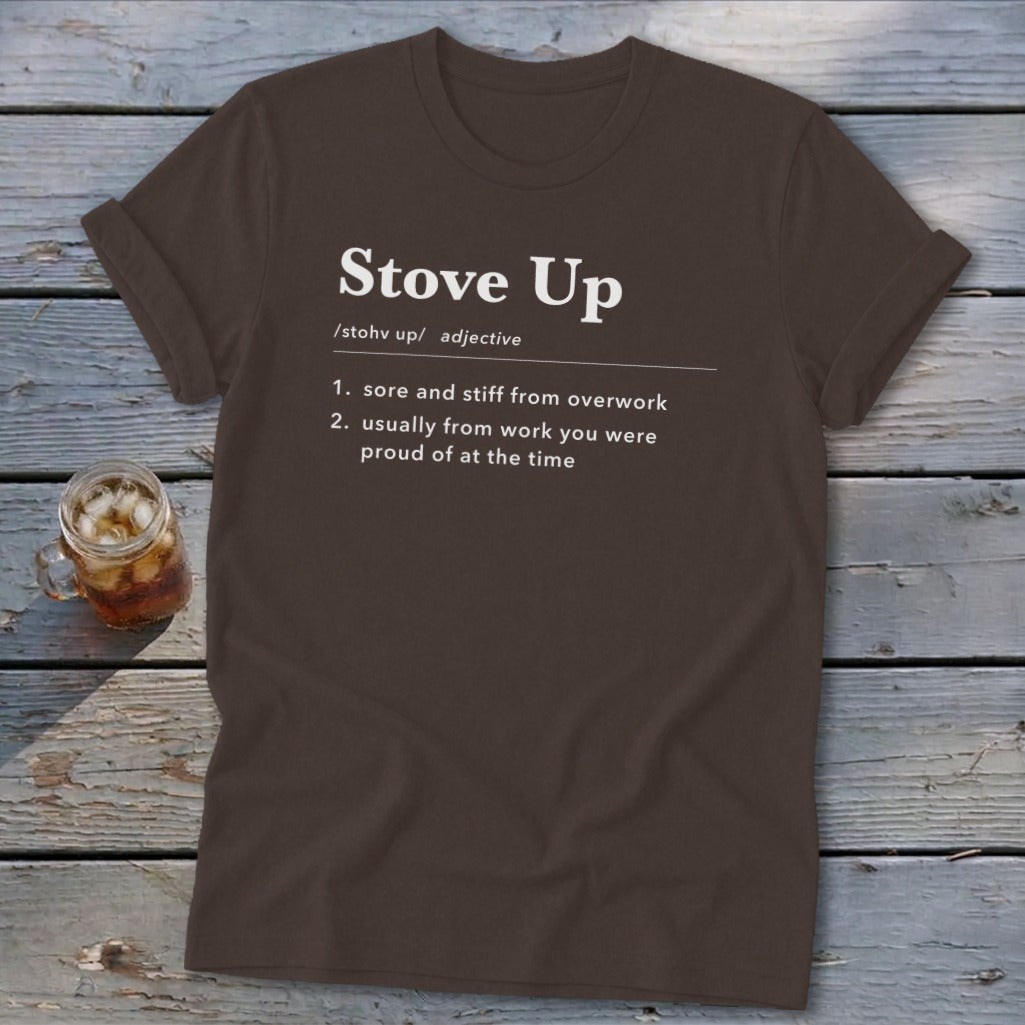 A brown t-shirt featuring the definition of "Stove Up" printed in white on the front.