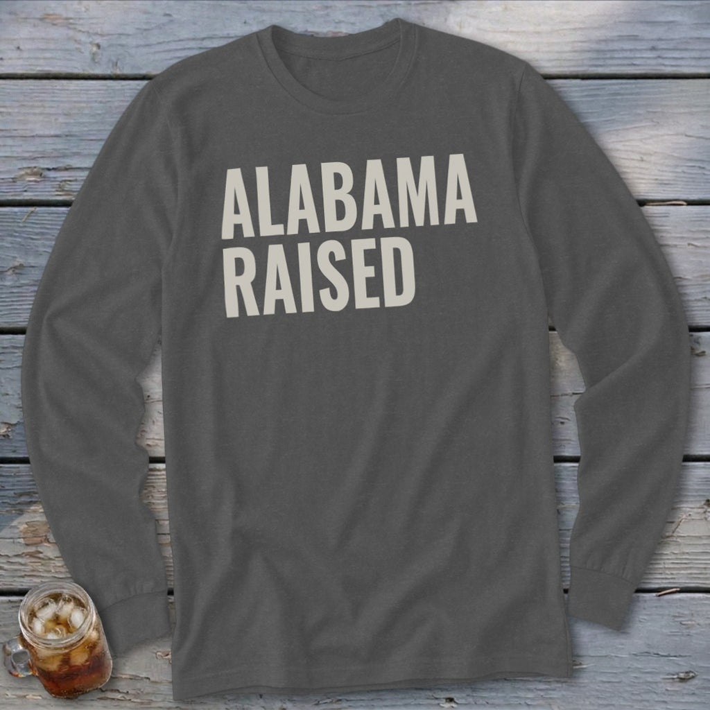 Dark gray long sleeve shirt with white "ALABAMA RAISED" text.