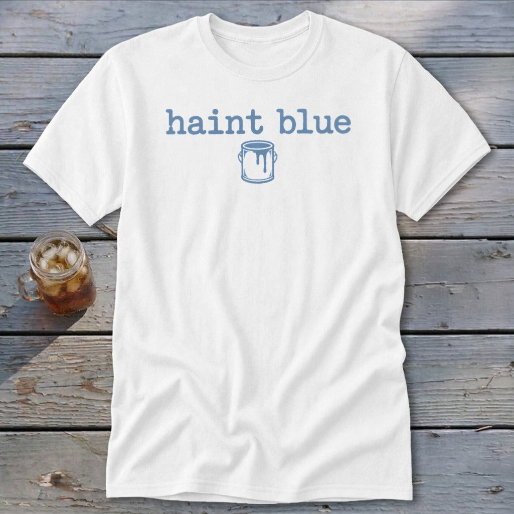 White t-shirt with "haint blue" text and a dripping paint can graphic.