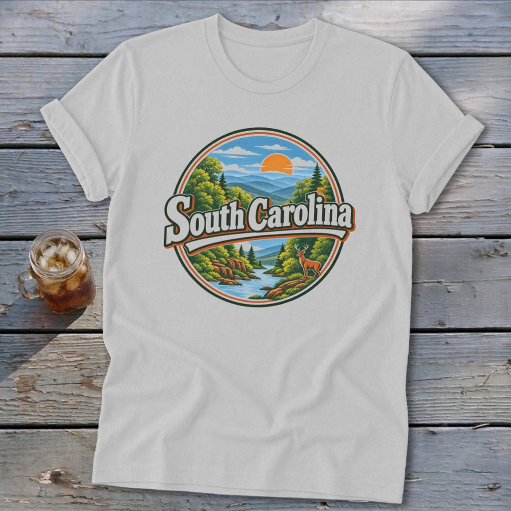 White t-shirt with circular graphic of South Carolina landscape with deer and mountains.