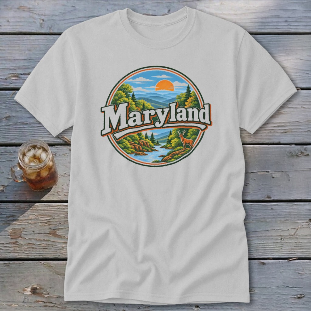 White t-shirt with circular Maryland landscape graphic featuring mountains, trees, river, and deer.