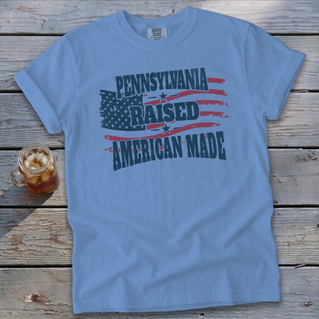 Light blue t-shirt with "PENNSYLVANIA RAISED AMERICAN MADE" in red and white flag design.
