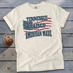 Cream t-shirt with "Tennessee Raised American Made" and distressed US flag.