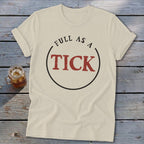 Cream t-shirt with "FULL AS A TICK" text inside a circle.