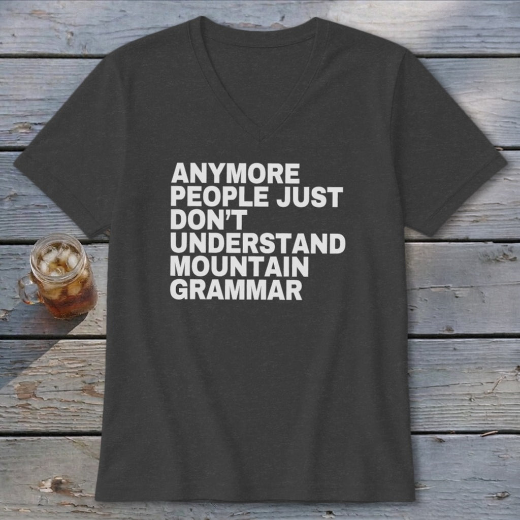 Dark grey V-neck t-shirt with white text reading "Anymore people just don't understand mountain grammar".