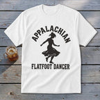 A white t-shirt featuring a black silhouette of a dancer and the text Appalachian Flatfoot Dancer.