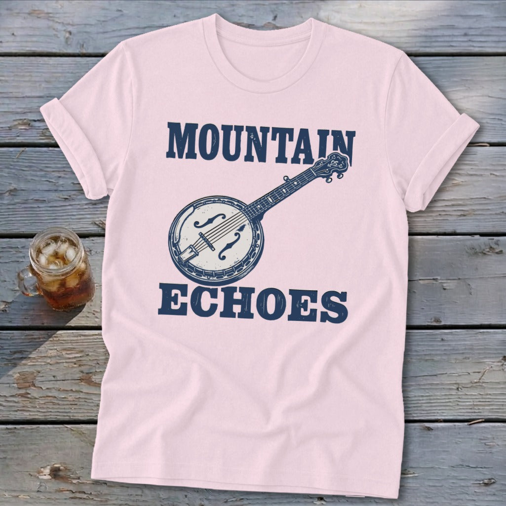 A light pink t-shirt with blue text reading Mountain Echoes and a banjo graphic.