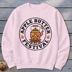 Light pink sweatshirt with "Apple Butter Festival" circular logo featuring a kettle over a campfire.