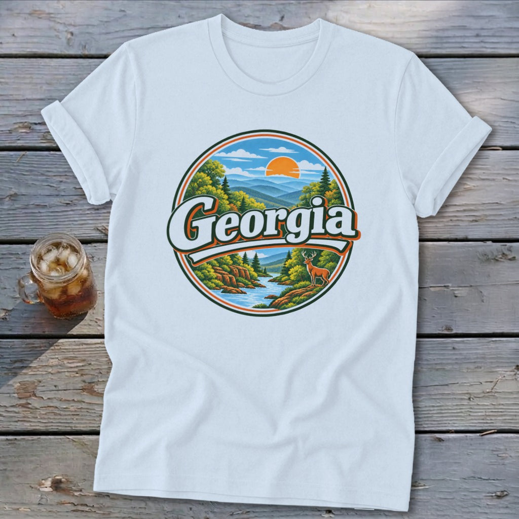 White t-shirt with a circular graphic of a Georgia landscape featuring a river, deer, and mountains.