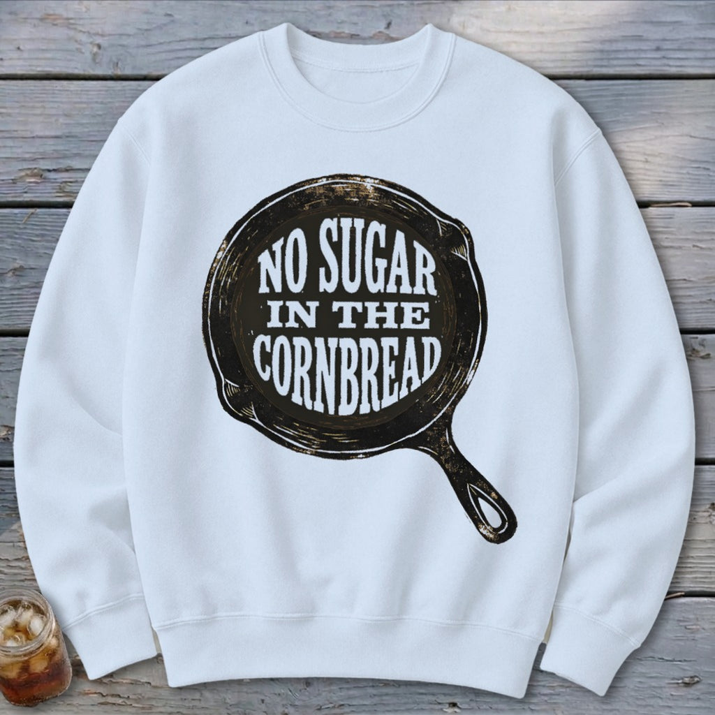 White sweatshirt with a graphic of a cast iron skillet with "No Sugar in the Cornbread" text.