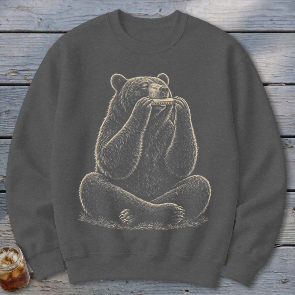 Dark gray sweatshirt with a drawing of a bear sitting cross-legged and playing a harmonica.
