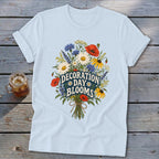 Light blue t-shirt with "Decoration Day Blooms" text over a floral bouquet.