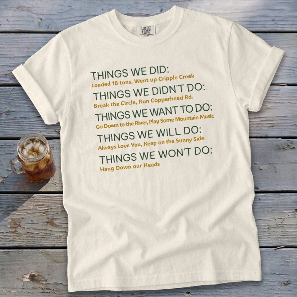 Cream t-shirt with green text listing things done, not done, wanted, will do, and won't do.