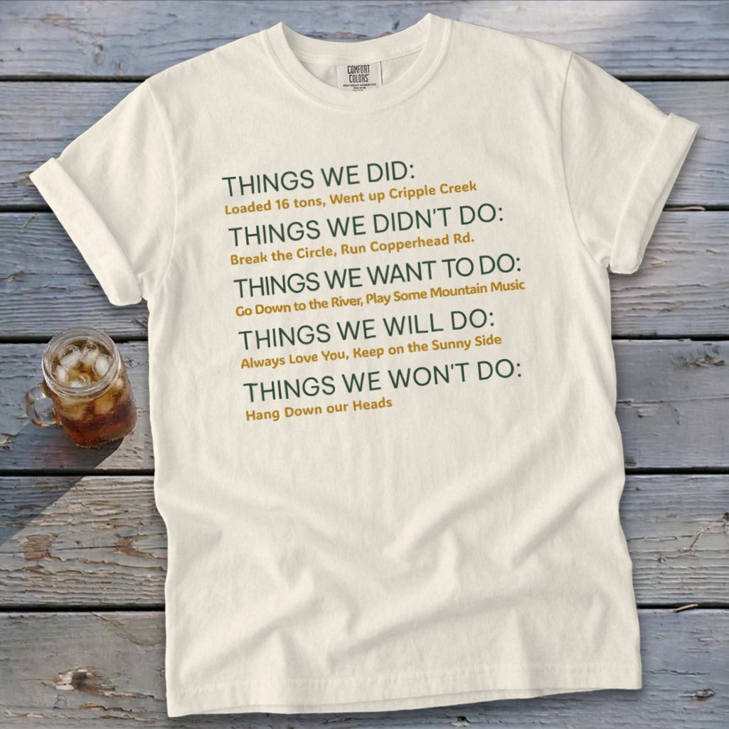 Cream t-shirt with green text listing things done, not done, wanted, will do, and won't do.