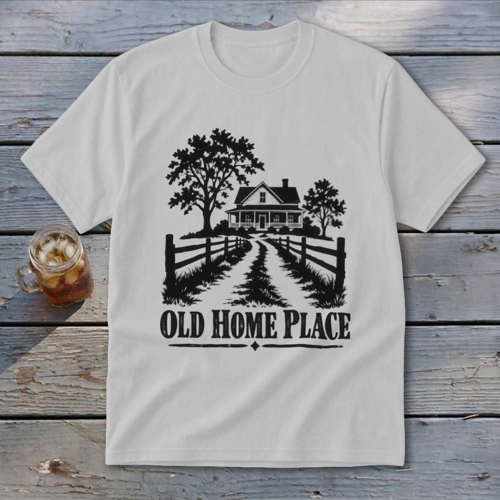White t-shirt with black graphic of a house, trees, fence, and text "OLD HOME PLACE".