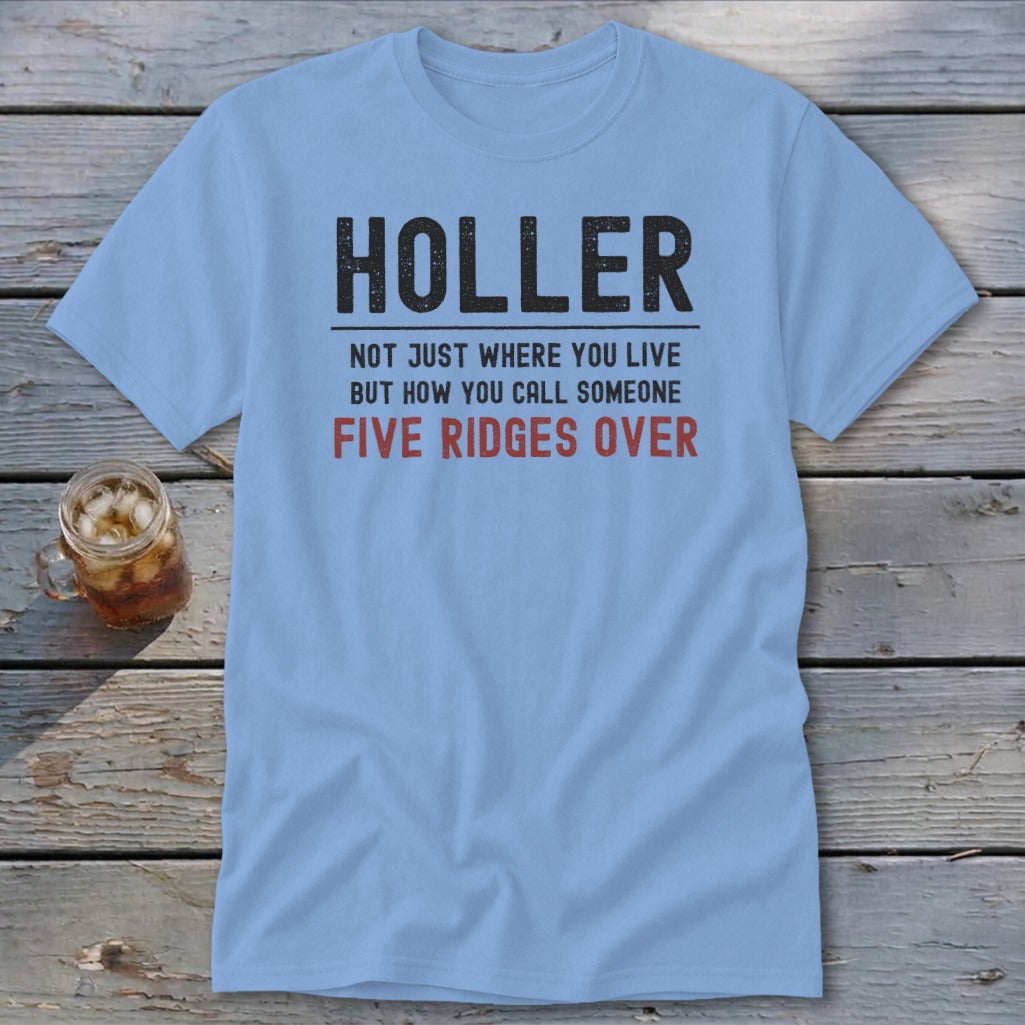 Light blue t-shirt with text "HOLLER" and "NOT JUST WHERE YOU LIVE BUT HOW YOU CALL SOMEONE FIVE RIDGES OVER".