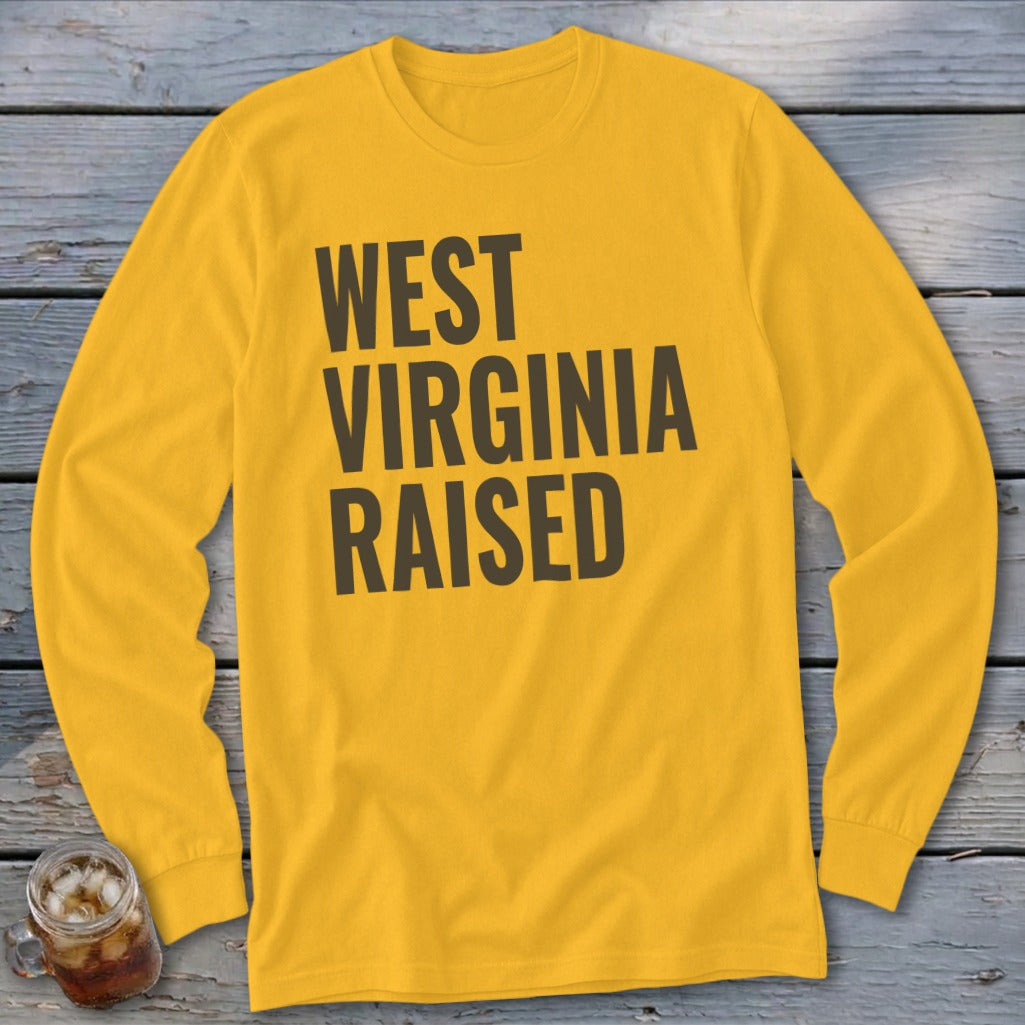 Yellow long-sleeve t-shirt with dark grey text "West Virginia Raised".