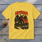 Yellow t-shirt with Mothman illustration and text above a town and bridge.