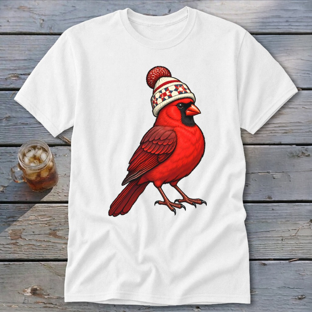 A white t-shirt featuring a graphic of a red cardinal wearing a winter beanie.