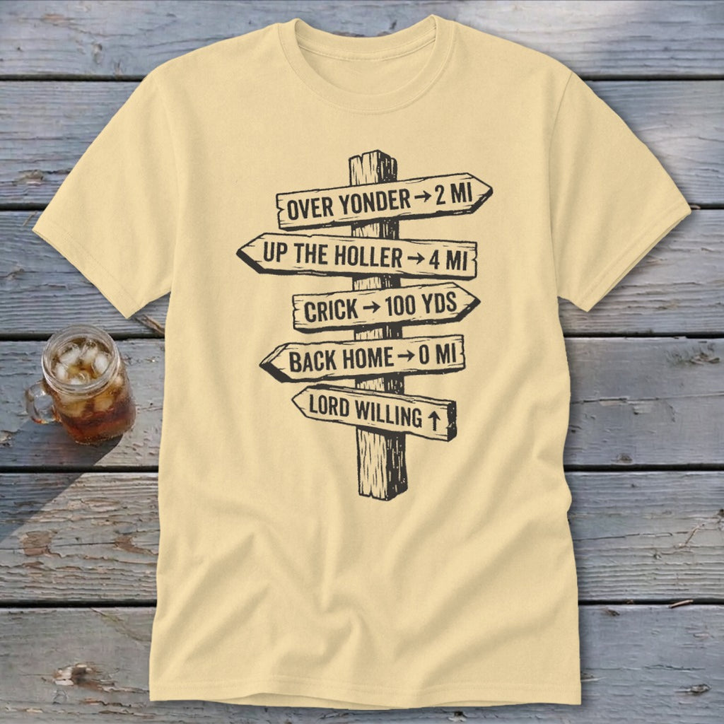 A cream-colored t-shirt with a graphic of a wooden signpost displaying humorous directional distances.