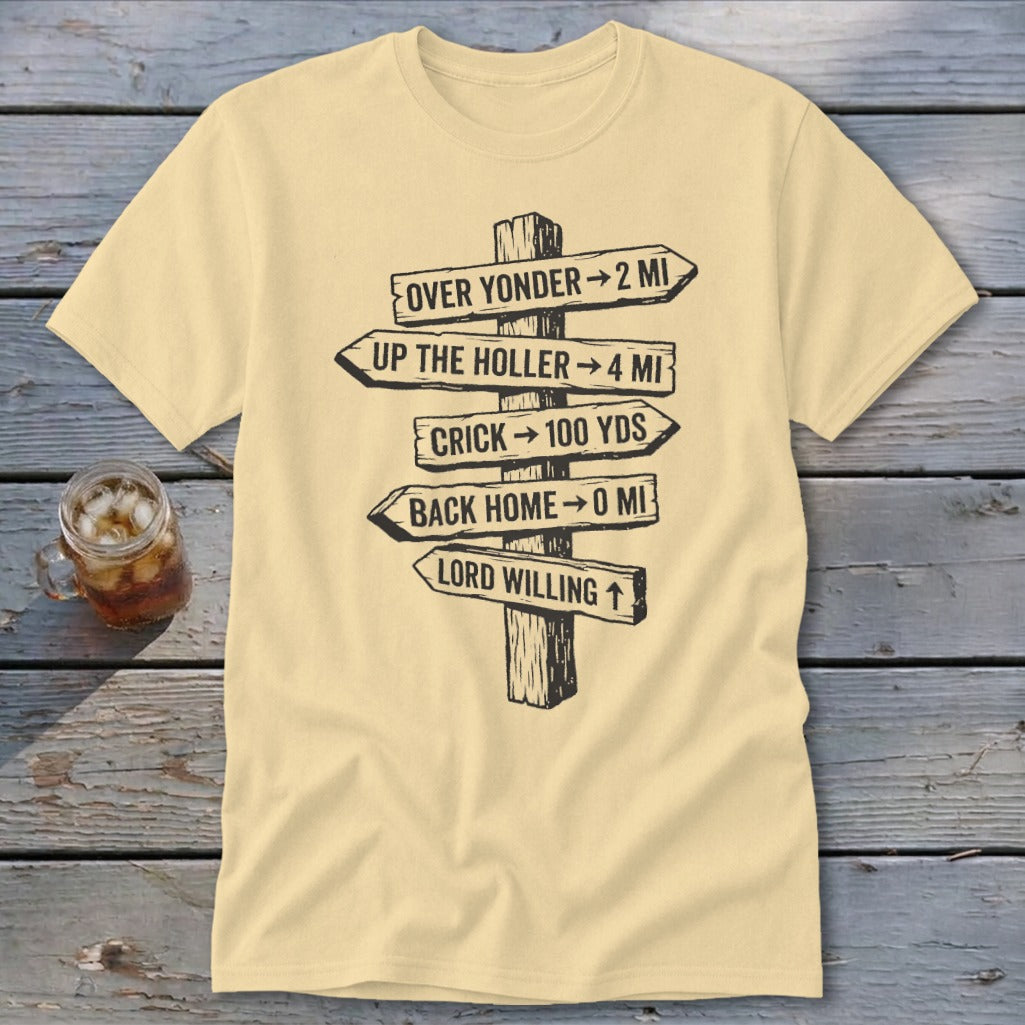 A cream-colored t-shirt with a graphic of a wooden signpost displaying humorous directional distances.