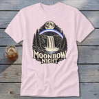 Pink t-shirt graphic with waterfall, moonbow, moon, trees, and text "Moonbow Night".
