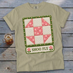 Light tan t-shirt with a Shoo Fly quilt block design and text.