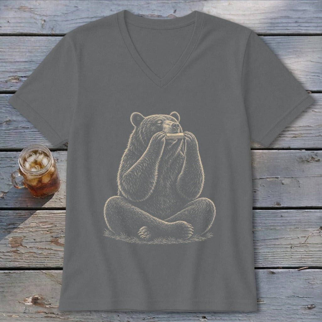T-shirt with a graphic of a bear sitting cross-legged playing a harmonica.