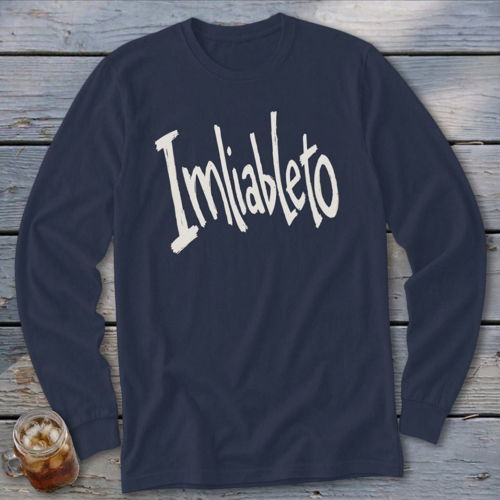 Navy long sleeve shirt with "Imliableto" graphic in off-white script.