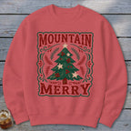 Red crewneck sweatshirt featuring a Christmas graphic with the text Mountain Merry surrounding a decorated tree.