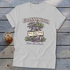 Granny Witch Holler-Born Healer t-shirt with botanical jar graphic and ingredient names.