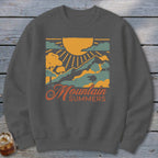 Dark grey sweatshirt with "Mountain Summers" text and a mountain landscape graphic.