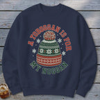 Dark blue crewneck sweatshirt featuring a graphic of a winter beanie and the text A TOBOGGAN IS FOR MY NOGGAN.