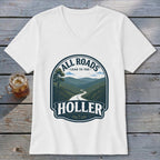 White t-shirt with a graphic that reads "ALL ROADS LEAD TO THE HOLLER".