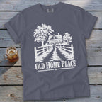 T-shirt graphic: white silhouette of a house, trees, fence, and text "OLD HOME PLACE".