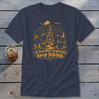 Navy t-shirt with orange graphic of mountains, lantern, and text "If you hear whistlin', keep hiking."