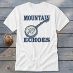 A white t-shirt featuring a blue graphic of a banjo and the text Mountain Echoes.
