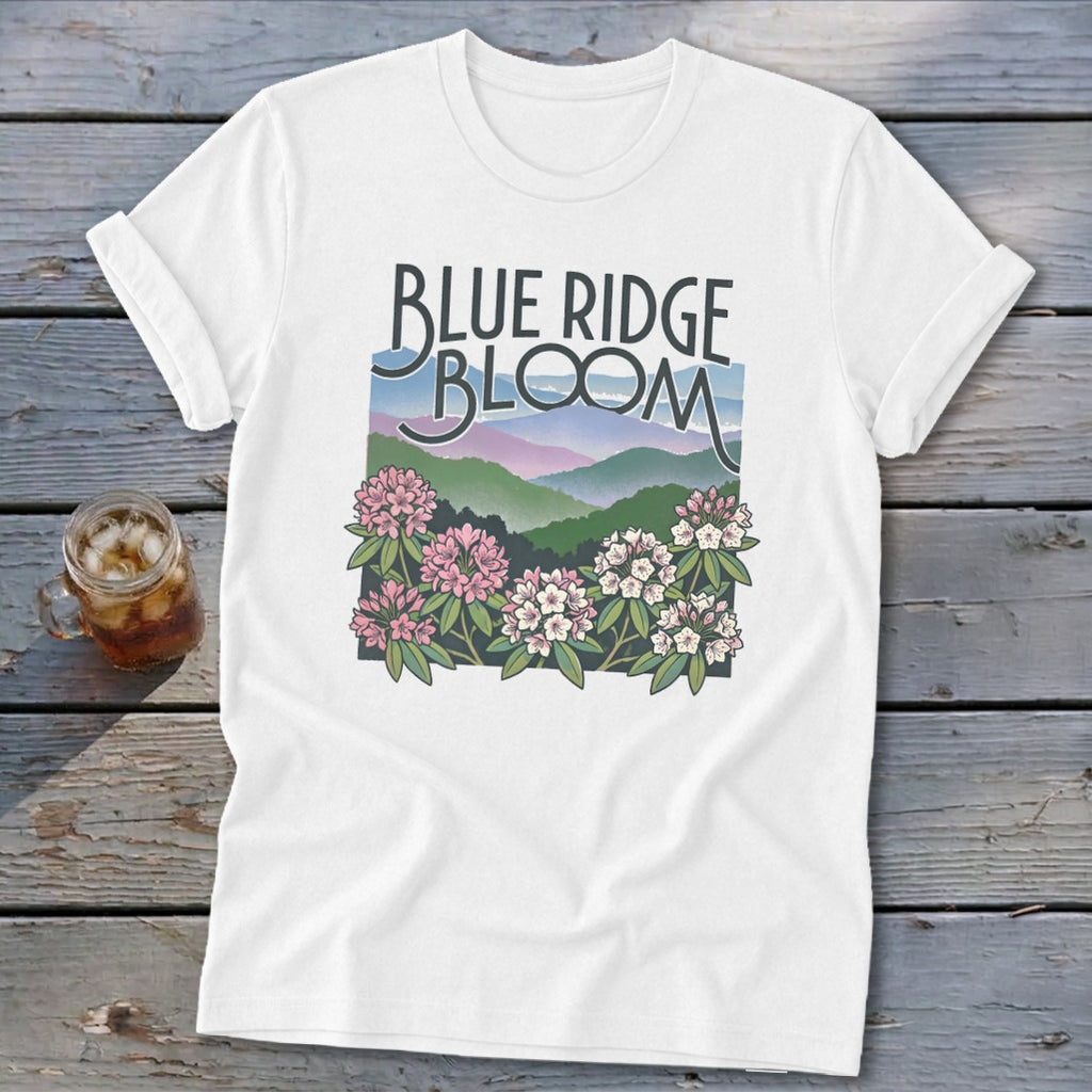 White t-shirt with "Blue Ridge Bloom" text and mountain and flower graphic.