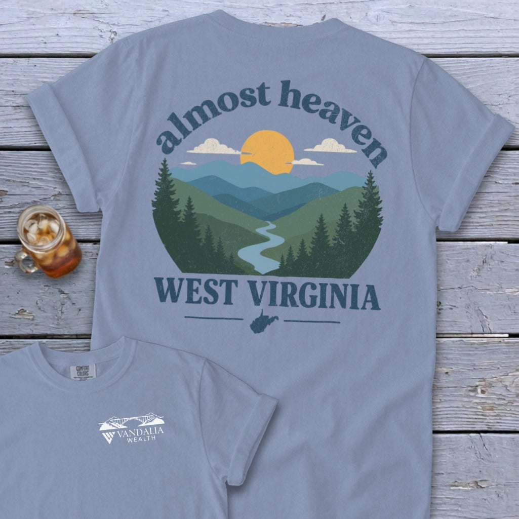 Blue t-shirt with "Almost Heaven West Virginia" landscape graphic on the back.