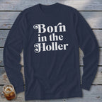 Navy long-sleeve shirt with white text "Born in the Holler."