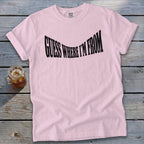 Light pink t-shirt with black text "GUESS WHERE I'M FROM".