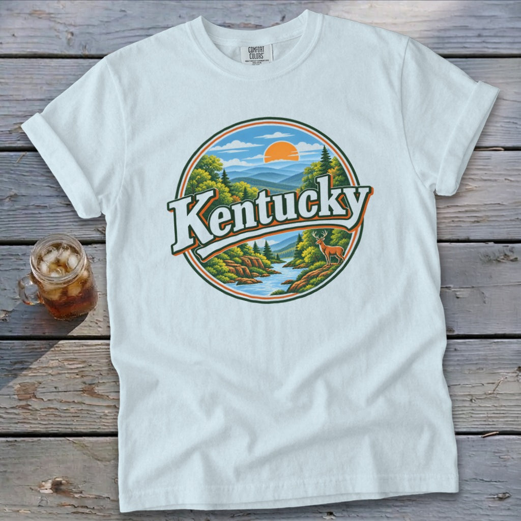 White t-shirt with "Kentucky" text and a scenic landscape design.
