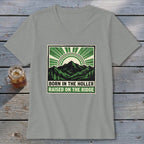Grey V-neck t-shirt featuring a green graphic of mountains and text that reads Born in the Holler Raised on the Ridge.
